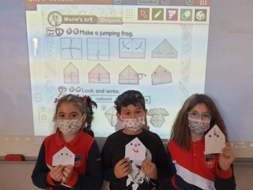 Marie's Art: Origami! We have created jumping frogs with 2-A students