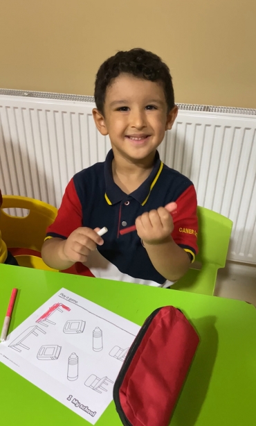 We played “Find the Pairs” game and learned classroom objects by having fun